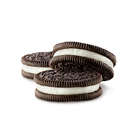 A stack of cream filled sandwich cookies